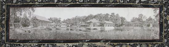 A Chinese machine embroidered silk picture of a garden with pavilions, early 20th century, 27 x 87cm